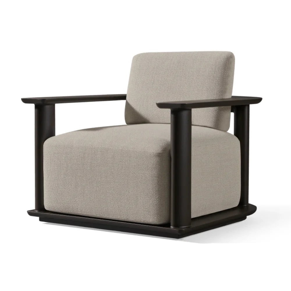 An Outdoor Lounge chair with an aluminum frame and a beige fabric cushion, perfect for outdoor design projects.