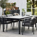 Boxhill's Ocean Outdoor Dining Armchair lifestyle image with dining table at patio