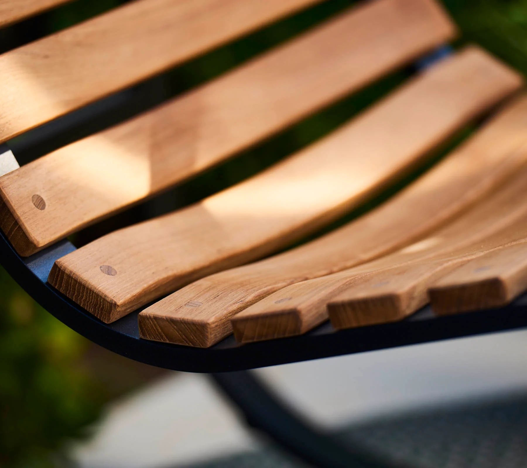 Boxhill's Parc teak outdoor rocking chair close up view