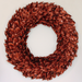 Brown leaf-like wreath on a white background