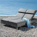   Boxhill's Rest grey outdoor chaise lounge | double sunbed blue fabric and glass of water placed on rocky shore