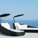 Boxhill's Savannah black outdoor  sectional chaise lounge with shade with white cushion and a sea view background