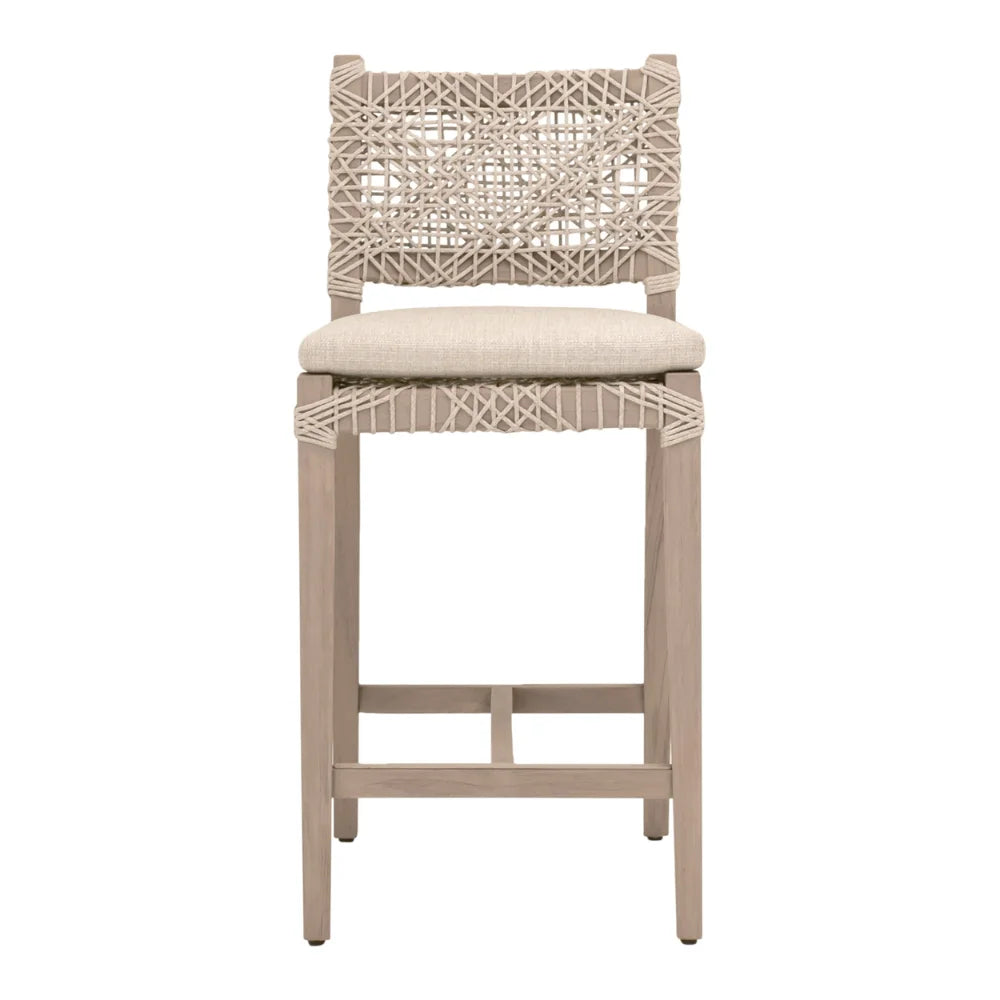Woven counter stool with beige cushion on a white background