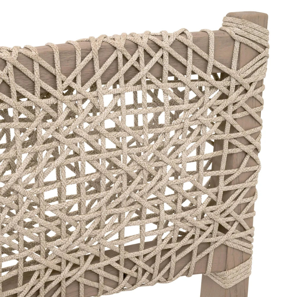 Close-up of woven beige rope chair with a white background