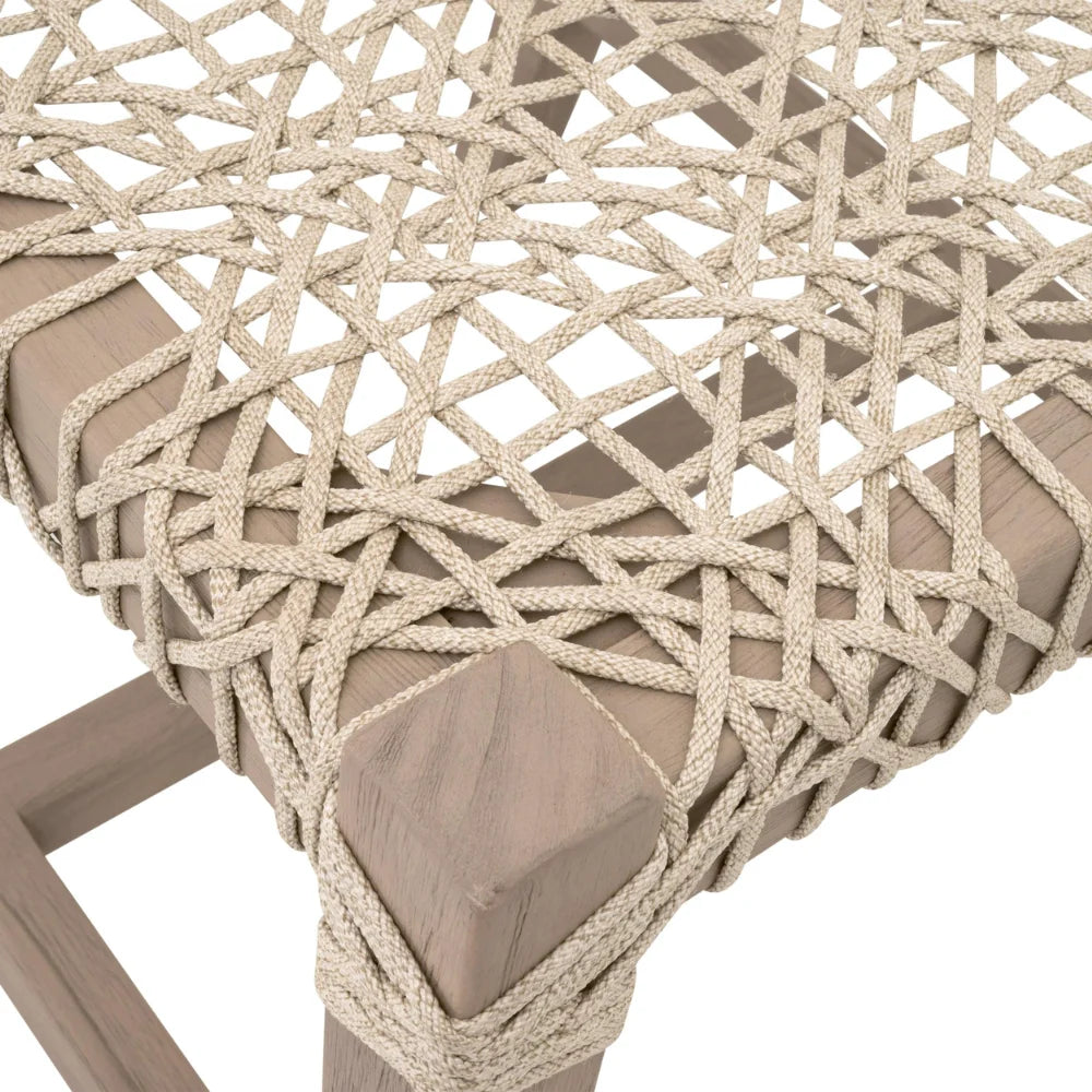 Close-up of a woven chair with a rope pattern on a white background