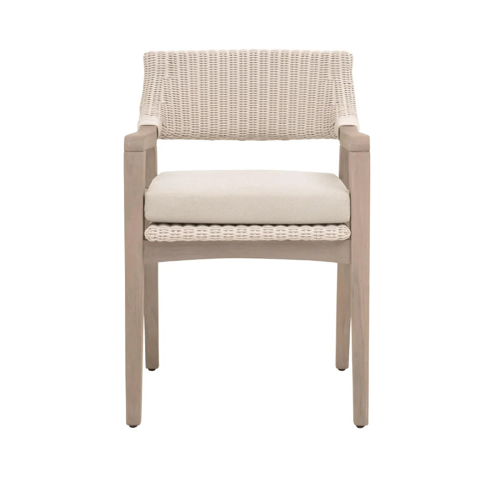 Beige wicker chair with white cushion on a white background