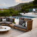 Boxhill's Arch 2-Seater Outdoor Sofa | High Arm/Back lifestyle image beside the pool