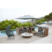 Boxhill's Arch 2-Seater Outdoor Sofa | Low Arm/Back lifestyle image beside the pool with man and woman sitting down