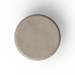 A round, flat-lay view of a light gray concrete table top with a subtle textured surface, centered on a white background with a soft drop shadow.