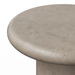 Close-up of a round concrete table top with a thick flared edge and a matching cylindrical pedestal base, shown on a plain white background.
