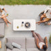 Boxhill's Aspect Rectangle Coffee Table Travertine Look lifestyle image Top view with 3 people sitting down