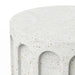Close-up of a white speckled round concrete outdoor coffee table on a white background