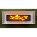 Top view of a White outdoor rectangular fire pit with geometric cut-out design with lit flames over lava rocks placed on a grassy field