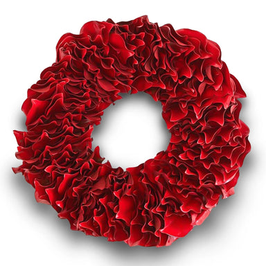 Decorative bright red lacquer wreath with glossy finish on a white background.