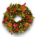 Handcrafted festive spring wreath with  green, red and orange natural texture accents