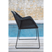Boxhill's Breeze Dining Weave Chair Black lifestyle image side view beside the pool