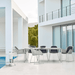 Boxhill's Breeze Dining Weave Chair White Grey lifestyle image with dining table beside the pool