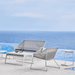 Boxhill's Breeze Outdoor Lounge Chair White Grey ifestyle image with Breeze 2-Seater Sofa beside the pool