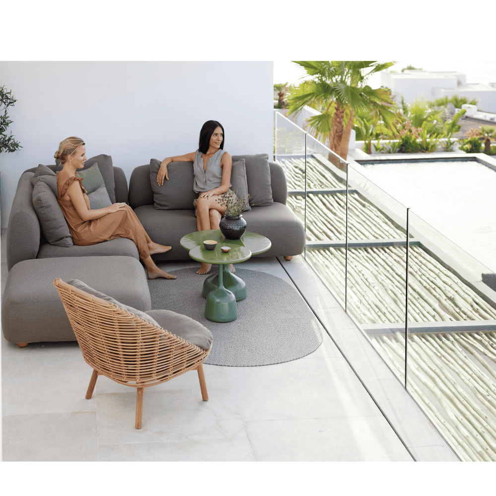 Boxhill's Capture 2-Seater Outdoor Sofa Left Module lifestyle image with other Capture Module Sofa on balcony with 2 women sitting down