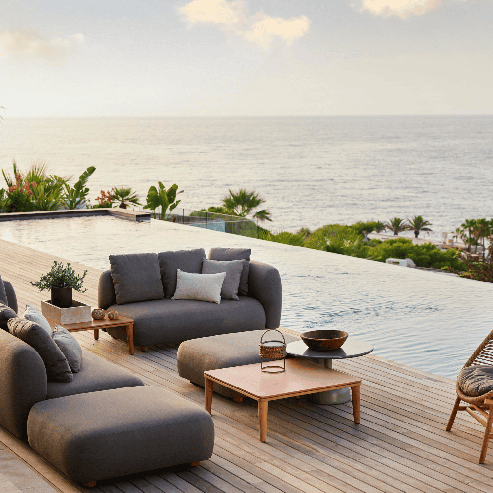 Boxhill's Capture 2-Seater Outdoor Sofa Left Module lifestyle image beside the pool