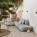 Boxhill's Capture Outdoor Pouf lifestyle image with Capture Module Sofa at patio