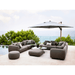 Boxhill's Capture Outdoor Corner Sofa w/ Table, Pouf, & Chaise lifestyle image with large shade umbrella beside the pool