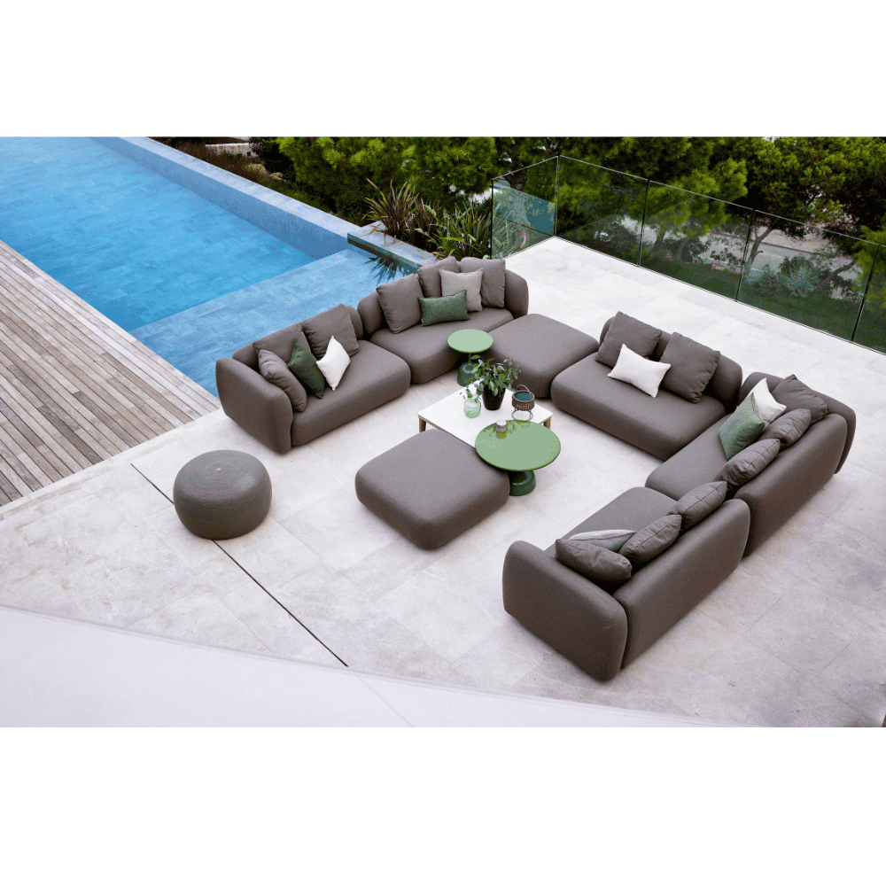 Boxhill's Capture Outdoor Corner Sofa w/ Table, Pouf, & Chaise lifestyle image beside the pool