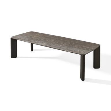 Dark gray rectangular outdoor dining table with textured surface on a white background