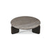Modern round patio coffee table with  gray  textured top on a white background