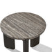 Round outdoor side table with gray textured tabletop on a white background