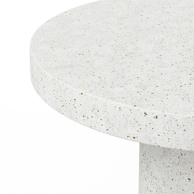 Close-up of a white speckled round outdoor counter table on a white background