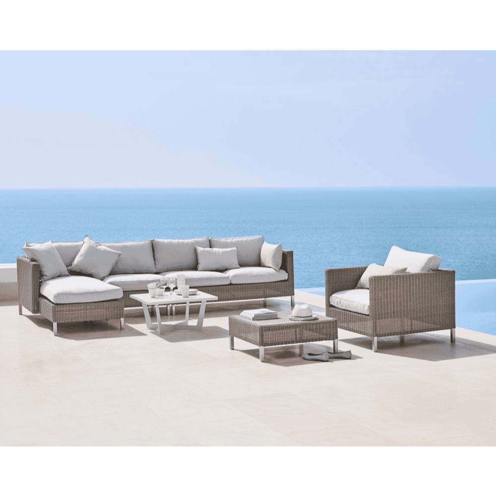 Boxhill's Connect 2-Seater Left Module Sofa lifestyle image with other Connect Module Sofa and Connect Lounge Chair at seafront