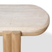 Round marble table top with wooden legs .