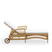 Natural wicker outdoor sunbed with white cushions, rear wheels and adjustable backrest viewed from the side.