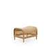 Natural wicker outdoor woven stool in a light tan finish featuring an open woven base.