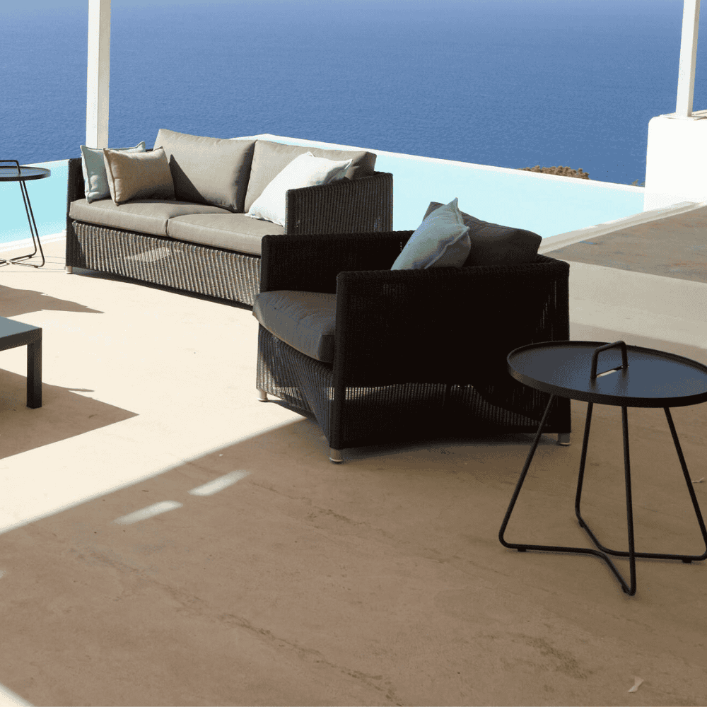 Boxhill's Diamond 2-Seater Weave Sofa lifestyle image with Diamond Weave Lounge Chair and a side table beside the pool