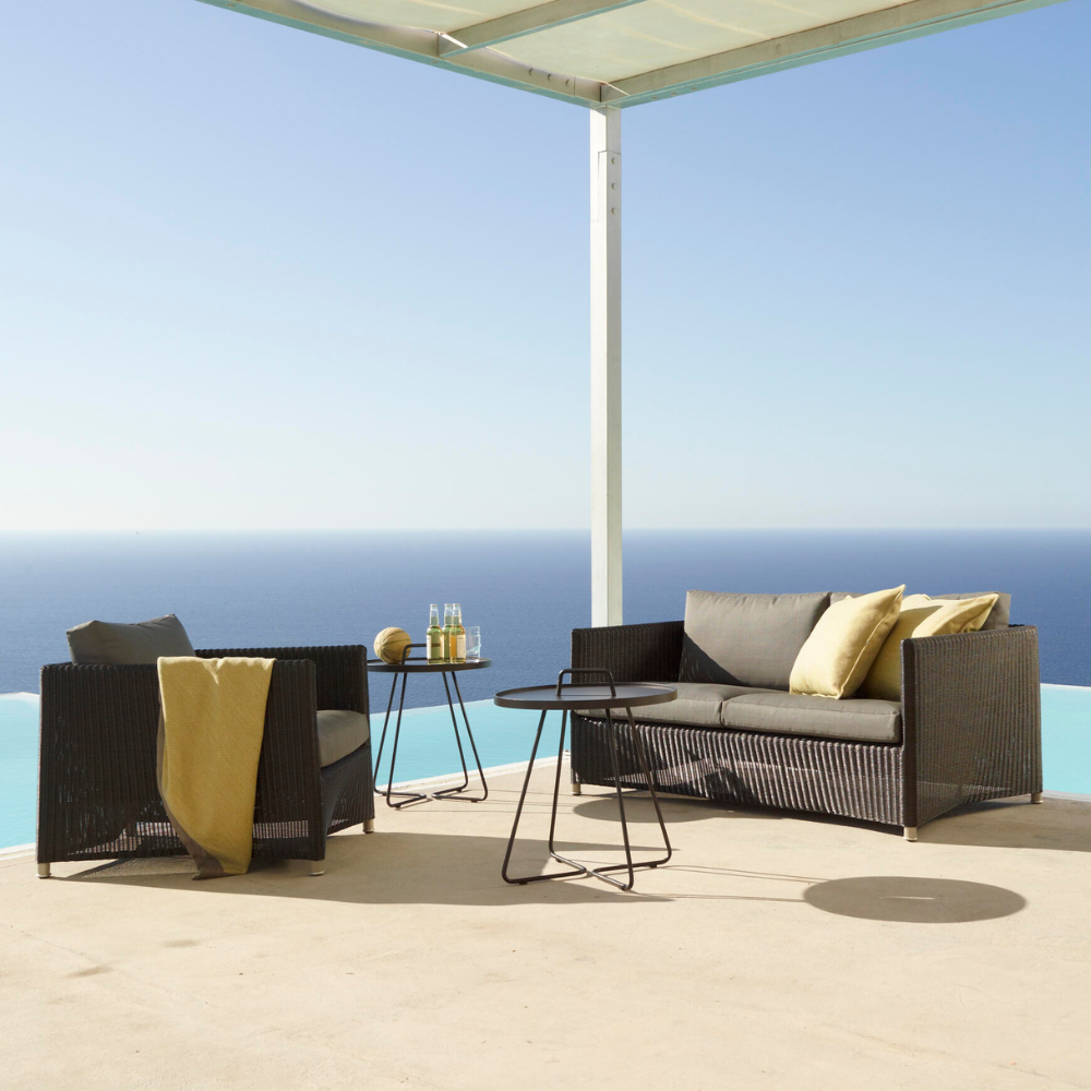 Boxhill's Diamond Weave Lounge Chair lifestyle image with Diamond 2-Seater Weave Sofa and side tables beside the pool