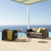 Boxhill's Diamond Weave Lounge Chair lifestyle image with Diamond 2-Seater Weave Sofa and side tables beside the pool