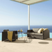 Boxhill's Diamond 2-Seater Weave Sofa lifestyle image with Diamond Weave Lounge Chair and a side table beside the pool