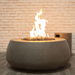 Dune Fire Bowl is a handcrafted outdoor concrete round fire bowl in grey with pebble stones by Boxhill