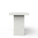 Side view of a white speckled concrete outdoor bar table on a white background