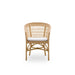 Natural rattan outdoor dining side chair in a light tan finish with a white seat cushion and open woven back.
