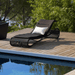 Boxhill's Escape Pool Side Sunbed Black Weave with Black Cushion lifestyle image with white pillow on top beside the pool
