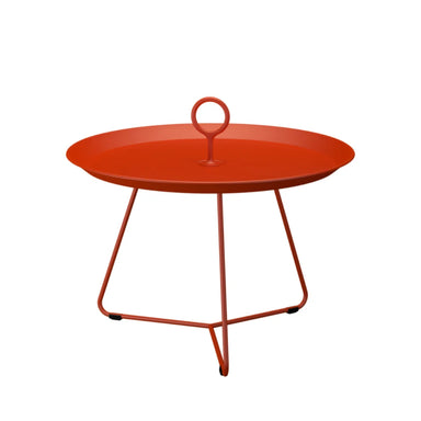 Orange metal round outdoor tray table with circular handle at the center on a white background