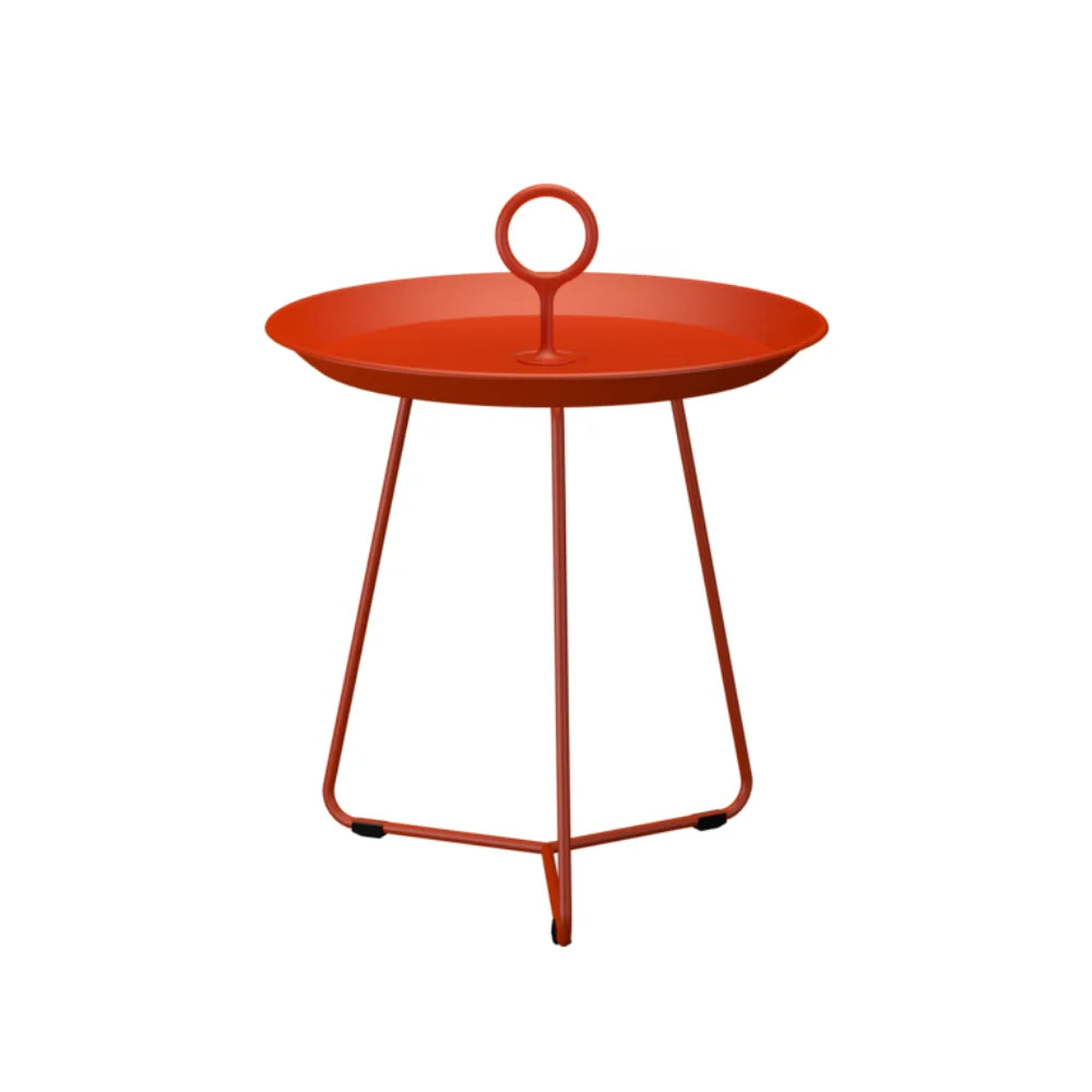 Orange round metal outdoor tray table circular handle at the center on a white background