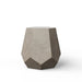 Geometric concrete outdoor side table or stool with faceted design in gray on a plain white background