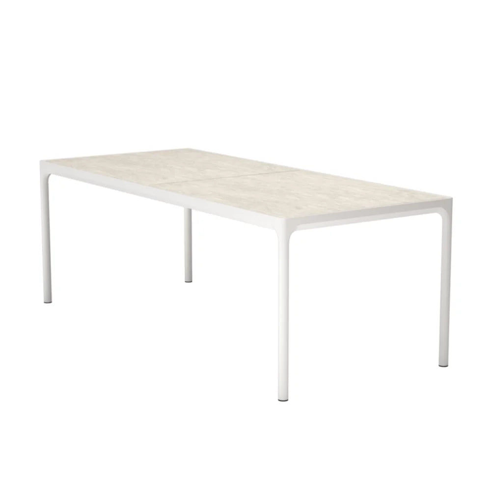 White rectangular ceramic outdoor dining table for patio dining on a solid white background
