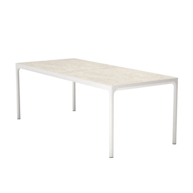 White rectangular ceramic outdoor dining table for patio dining on a solid white background