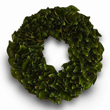 Decorative dark green lacquer wreath with glossy finish on a white background.