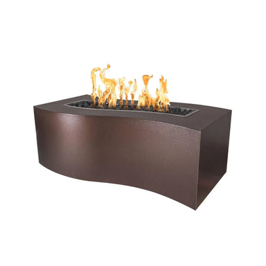 Dark brown hammered copper outdoor metal fire pit with lava rocks and flames on top